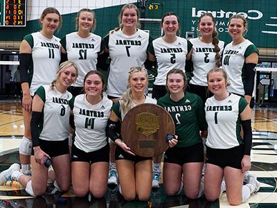 CCC volleyball team poses with Region 9 Trophy